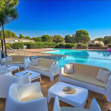 Fiori Di Cala Rossa Residence Hoteliere Lecci Exterior foto