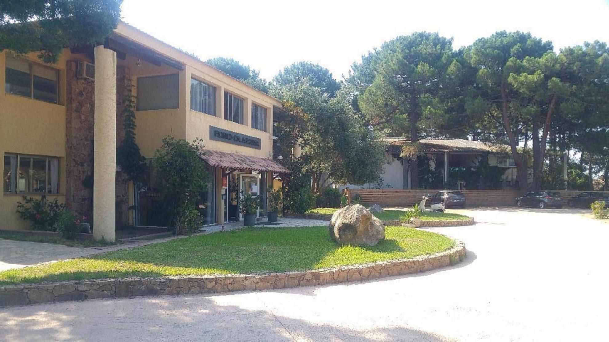 Fiori Di Cala Rossa Residence Hoteliere Lecci Exterior foto